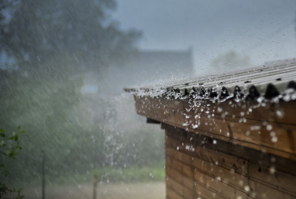 Blog - rain flows down from a roof down