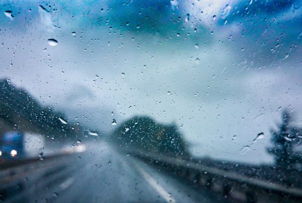 Blog - Blurred View of Highway Traffic in the Rain