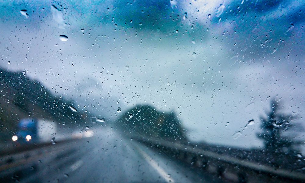 Blog - Blurred View of Highway Traffic in the Rain