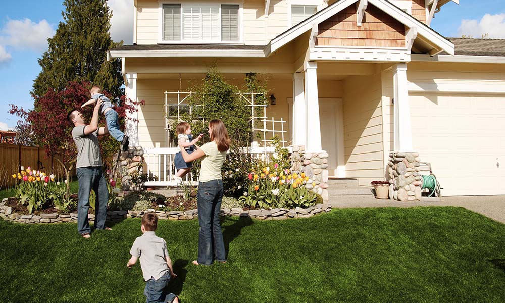 Blog - Family Playing Outside Their Two Story Home on a Beautiful Day